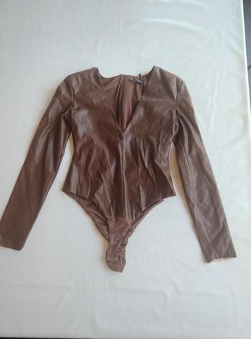 bodysuit disponible aux enchères