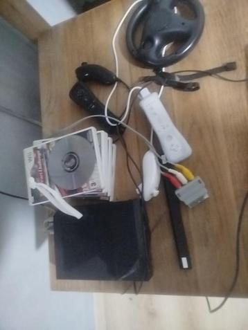 Wii avec 5 jeux 2 manettes volant  beschikbaar voor biedingen