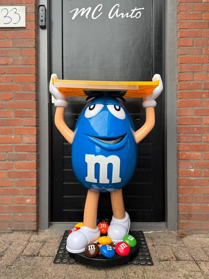 Image publicitaire du magasin M&M bleue, Collections, Marques & Objets publicitaires, Utilisé, Panneau publicitaire, Enlèvement