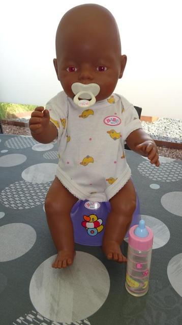 BABY BORN POP DONKERE HUIDKLEUR beschikbaar voor biedingen