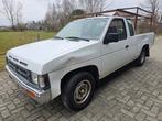 Nissan Pick up Navara 1990 Airco Benzine Start en rijdt, Auto's, Bestelwagens en Lichte vracht, Stof, 4 cilinders, Wit, Nissan