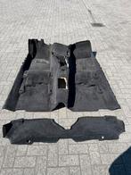 E36 sedan zwart tapijt, Ophalen