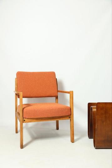 Moderne fauteuil pompoen oranje krullend gerenoveerde woonka