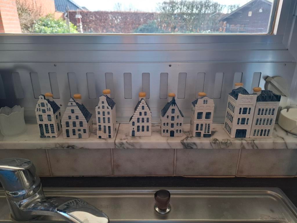 Bleu delft's huisjes, Ophalen