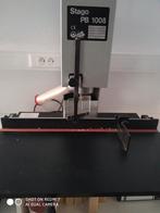 papier boormachine Stago, Ophalen