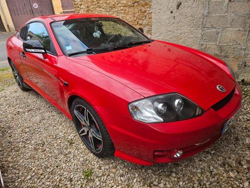 Hyundai coupé FX Tuscani Tiburon, Auto's, Hyundai, Particulier, Coupé, Benzine, Coupé, 3 deurs, Handgeschakeld, Rood, Zwart, Leder en Stof