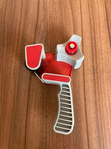 Tape dispenser / afroller  beschikbaar voor biedingen