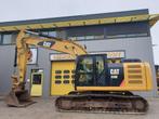 Caterpillar 320EL, Articles professionnels, Excavatrice