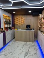 winkel over te nemen