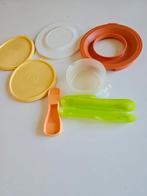 Tuperware deksel en potje, Ophalen