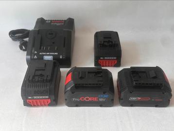 Bosch oplader plus 4 batterijen pro core 5.5 AH beschikbaar voor biedingen
