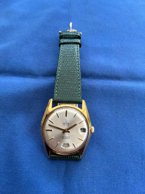 Helva 2000 Opwindbaar Vintage Herenhorloge, Handtassen en Accessoires, Horloges | Heren, Zo goed als nieuw, Polshorloge, Overige merken