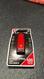 Lezyne Strip Pro AI Alert, Vélos & Vélomoteurs, Accessoires vélo | Éclairage de vélo, Neuf, Enlèvement ou Envoi, Batterie, Résistant à l'eau