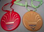 2 soorten Medailles  Pontiac Horloges., Overige merken, Overige materialen, Polshorloge, 1960 of later