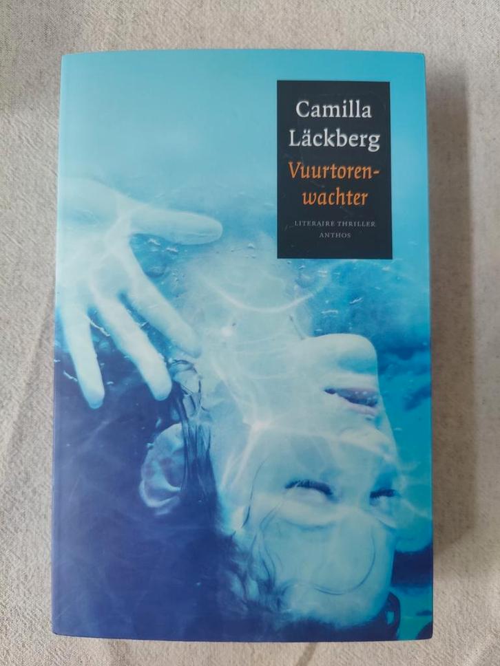 Camilla Läckberg - Vuurtorenwachter, Boeken, Thrillers, Zo goed als nieuw, Ophalen of Verzenden