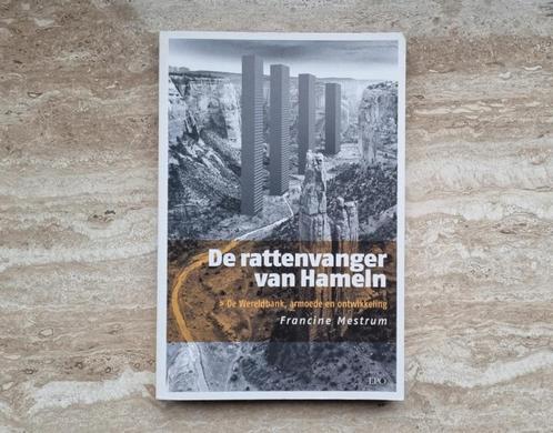 De rattenvanger van Hameln over donkere kant van Wereldbank, Boeken, Politiek en Maatschappij, Nieuw, Maatschappij en Samenleving