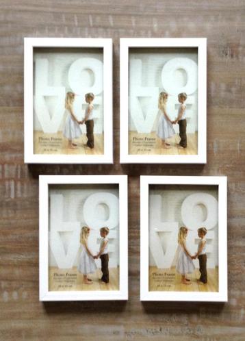 4 witte fotokadertjes in kunststof frame 10x15 beschikbaar voor biedingen