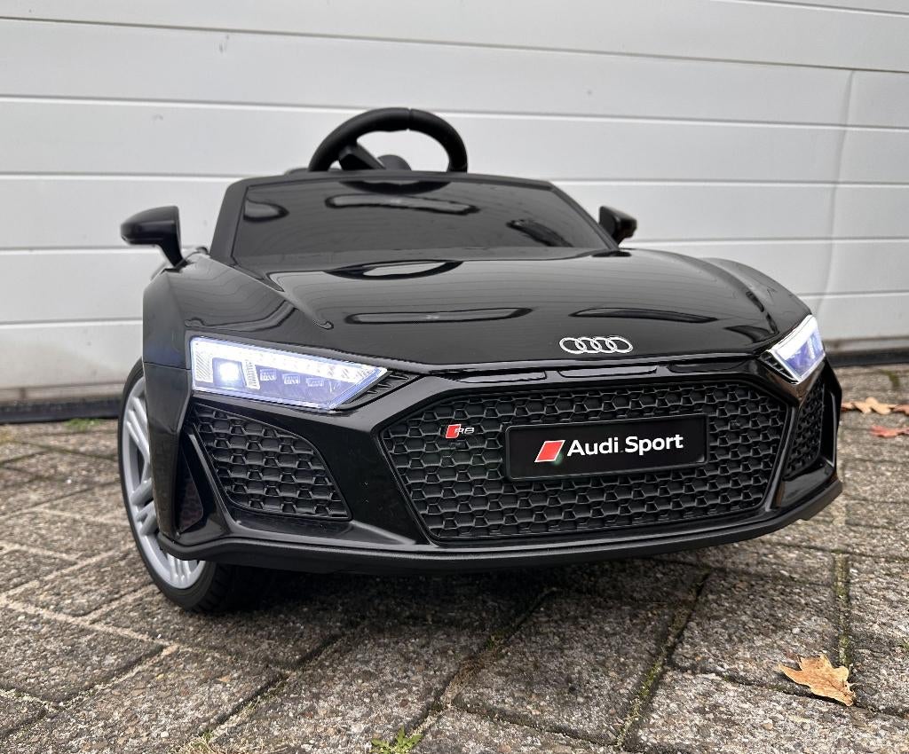 Audi R8 12v zwart Afstands. - Bluetooth - Leder en Rubberba, Kinderen en Baby's, Speelgoed | Buiten | Accuvoertuigen, Ophalen of Verzenden