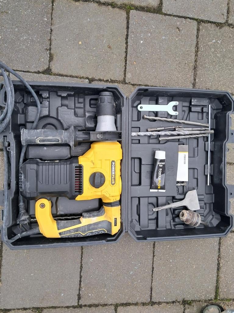 Klopboornachine met drilhamer., Ophalen