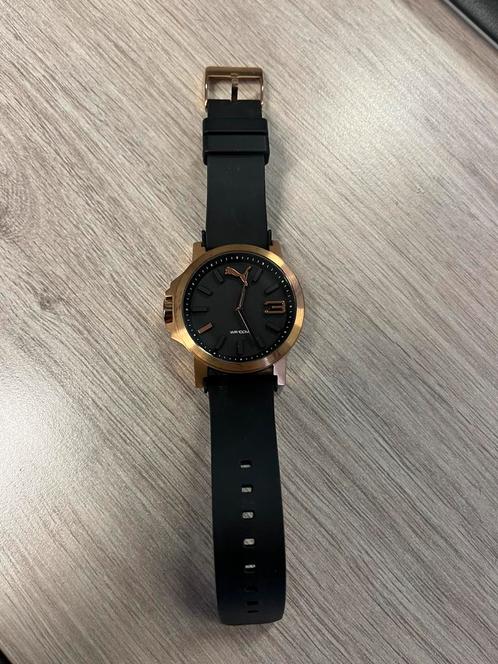 Zwart horloge Puma - Met koperkleurige details, Bijoux, Sacs & Beauté, Montres | Femmes, Comme neuf, Montre-bracelet, Acier, Synthétique