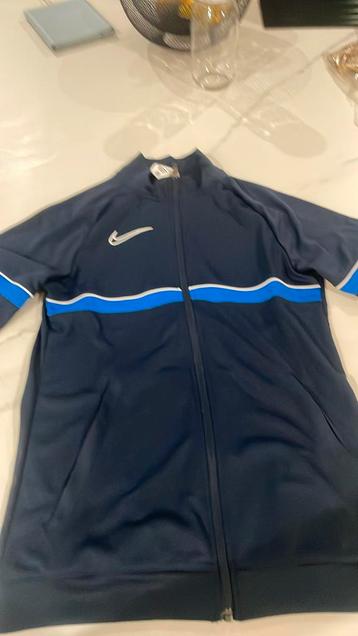 gillet de sport nike bleu  beschikbaar voor biedingen