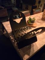 Houtmand in ijzer, Ophalen