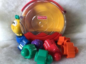 Fisher-Price. Zingende slak met insteek vormpjes beschikbaar voor biedingen