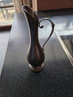 tinnen vaas, Ophalen