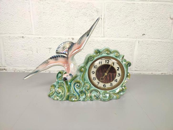 Porseleinen klok met vogel, Antiek en Kunst, Antiek | Klokken, Ophalen of Verzenden