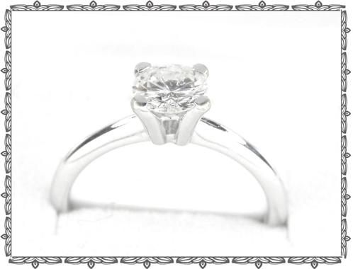 18KT solitaire met grote Briljant geslepen diamant (0.72crt), Handtassen en Accessoires, Ringen, Zo goed als nieuw, Dame, 17 tot 18