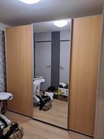 Kleerkast met schuifdeuren, Ophalen