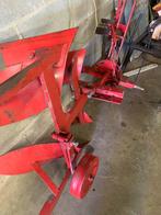 Wentelploeg minni tracktor, Ophalen