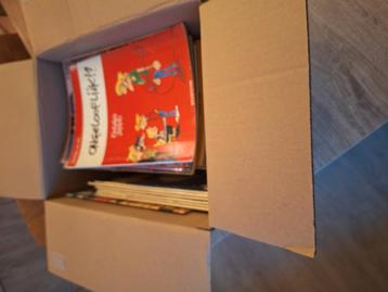 Doos met +/- 60 strips .... beschikbaar voor biedingen