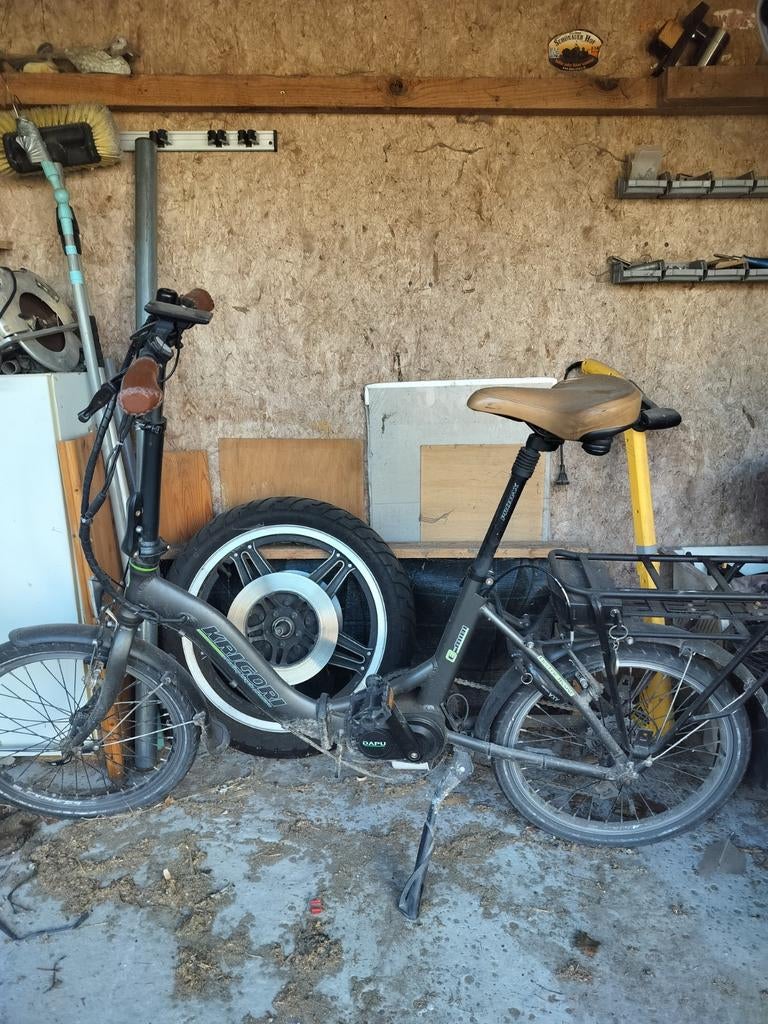 Elektrische plooifiets met herstelling aan, Enlèvement