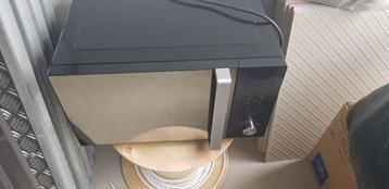 Microgolf thomson met grill beschikbaar voor biedingen