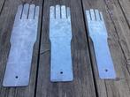 Mal handschoen, Ophalen