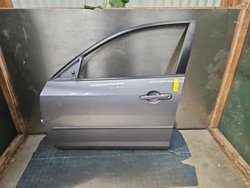 Portier 4Deurs links-voor van een Mazda 3. beschikbaar voor biedingen