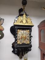 antieke klok, Ophalen