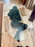 Glazen ovale tafel met beeld, Ophalen, Gebruikt, 100 tot 150 cm, 50 tot 100 cm