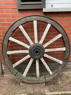 Antiek oud wagenwiel, Ophalen