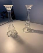 Een paar glazen kandelaars, Ophalen