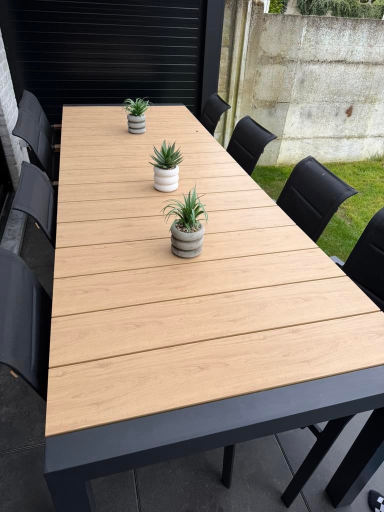 Uitschuifbare tuintafel inclusief 8 stoelen, Ophalen of Verzenden, Zo goed als nieuw