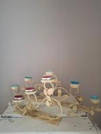 Theelichthouder met roosjes in metaal, Enlèvement, Métal