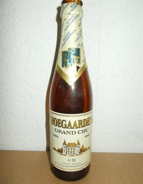 HOEGAARDEN - bierfles met etiket-GRAND CRU - tht 1994 - 1, Collections, Marques de bière, Utilisé, Bouteille(s), Jupiler, Enlèvement ou Envoi