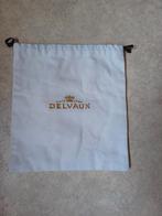 DELVAUX Omslag met gouden letters en logo, Verzenden