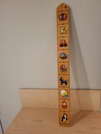 Houten groeimeter, Ophalen