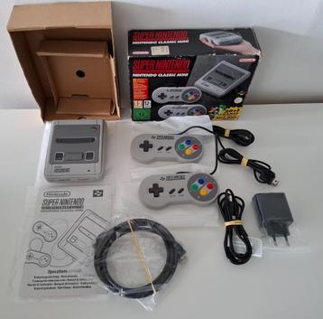 SNES Mini in prima conditie inclusief USB lader beschikbaar voor biedingen