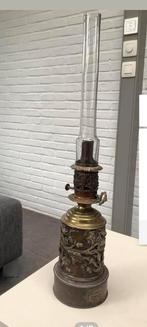 Oude koperen petroleum lamp, Ophalen