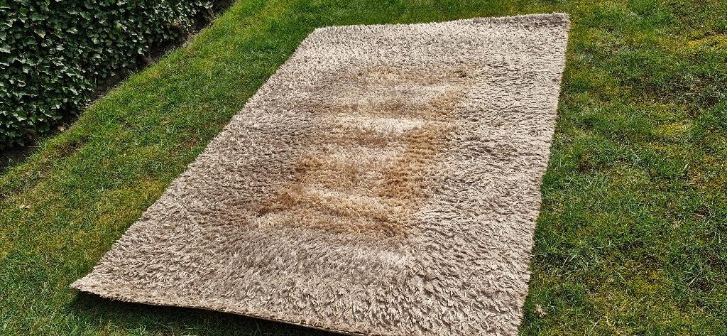 Tapijt taupekleur, Ophalen, Gebruikt