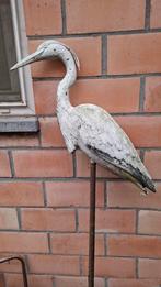 Reiger van plastiek, op een paal, Ophalen